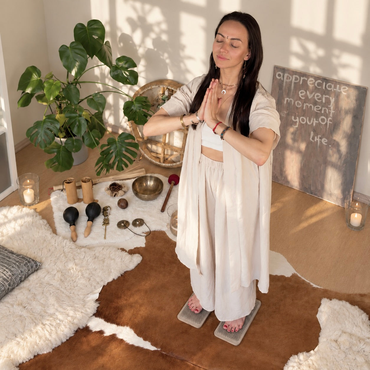 Maya Orisha is standing on the nails in her own studio